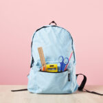 school blue backpack with stationery in pocket