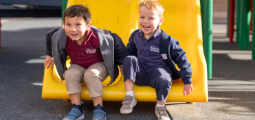 Kids on slide preschool
